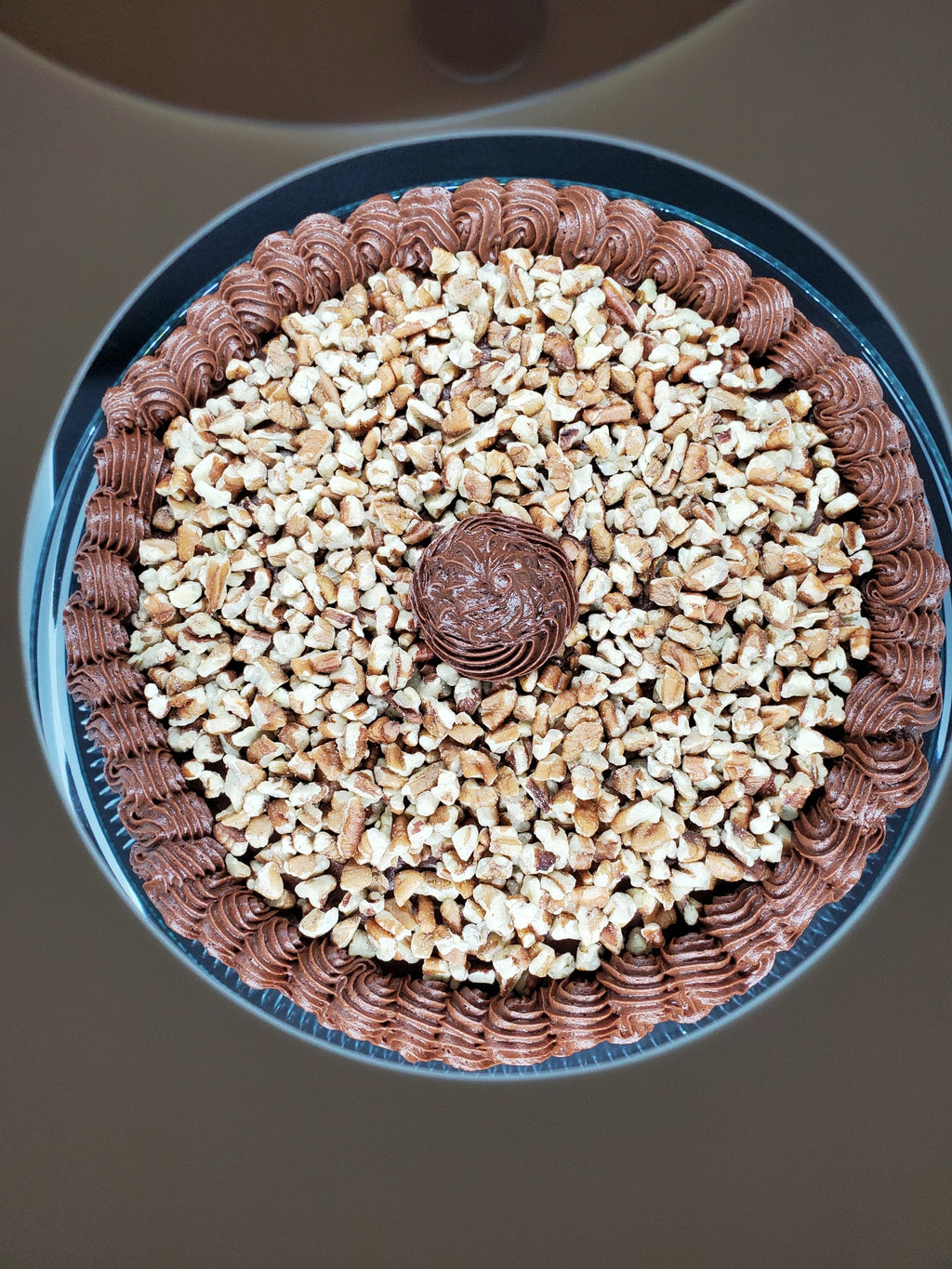 9 inch Chocolate Coffee Cake with walnuts on top